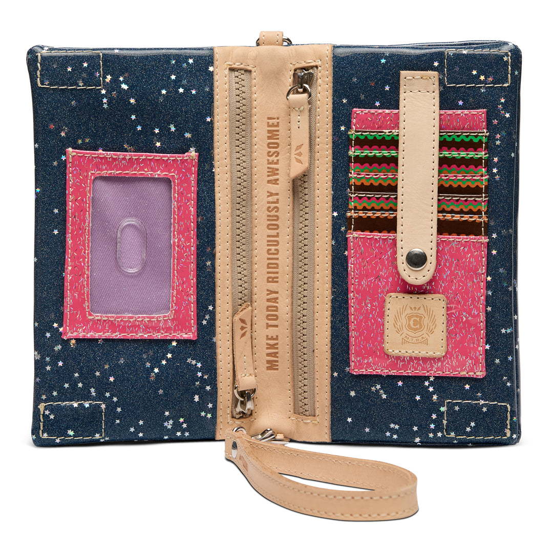 Blue denim wallet with pink interior and beige strap on a white background