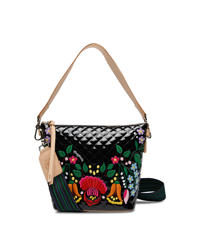 Handbag with floral embroidery on a white background