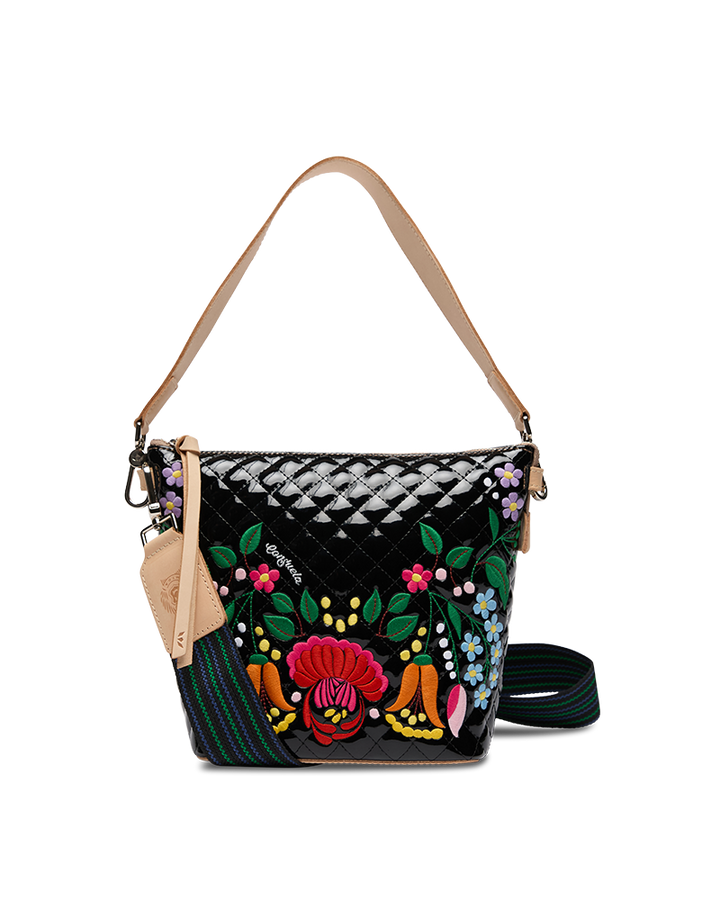 Handbag with floral embroidery on a white background