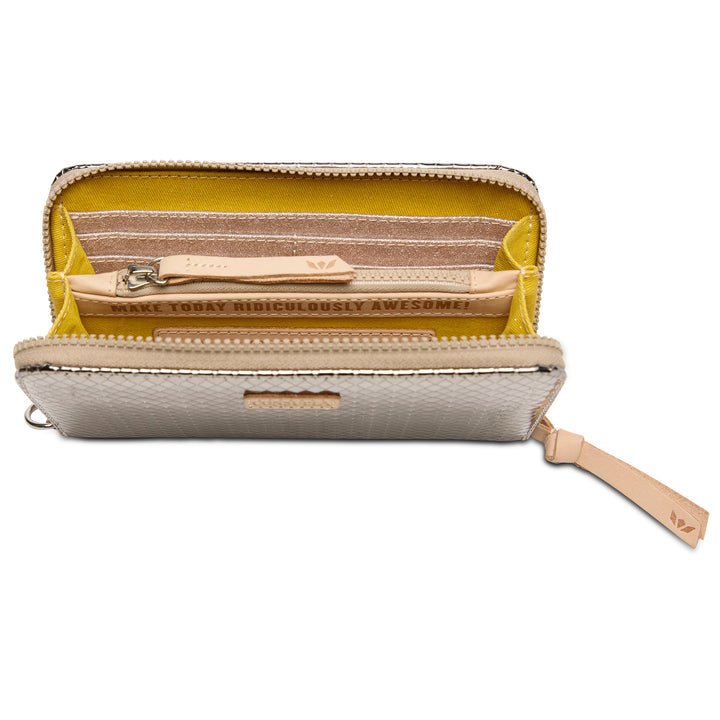 Open beige wallet with yellow interior on a white background