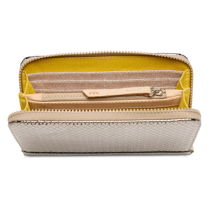 Small wallet with yellow interior and beige exterior on a white background