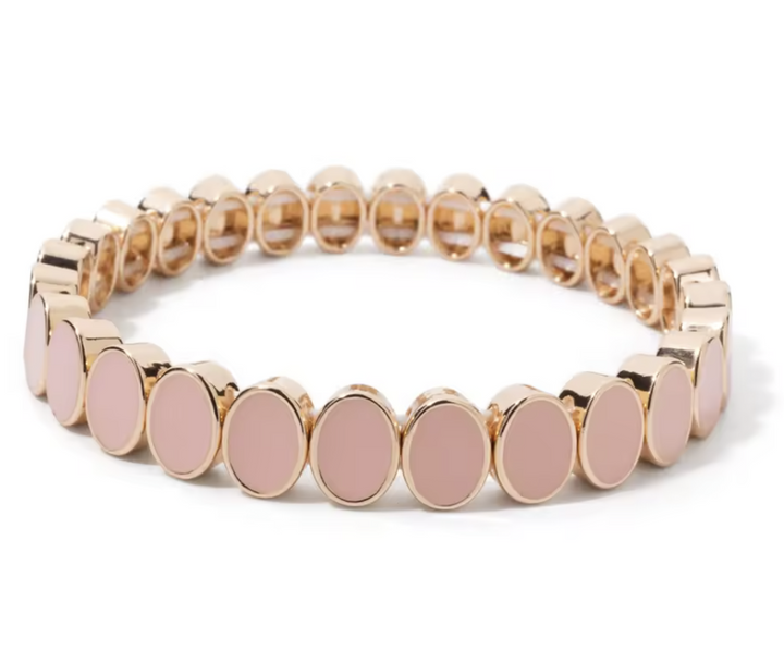 Bracelet with pink circular charms on a white background