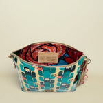 Point of Origin CONSUELA Desi Downtown crossbody bag with cactus print, interior floral lining, and inspirational leather patch.