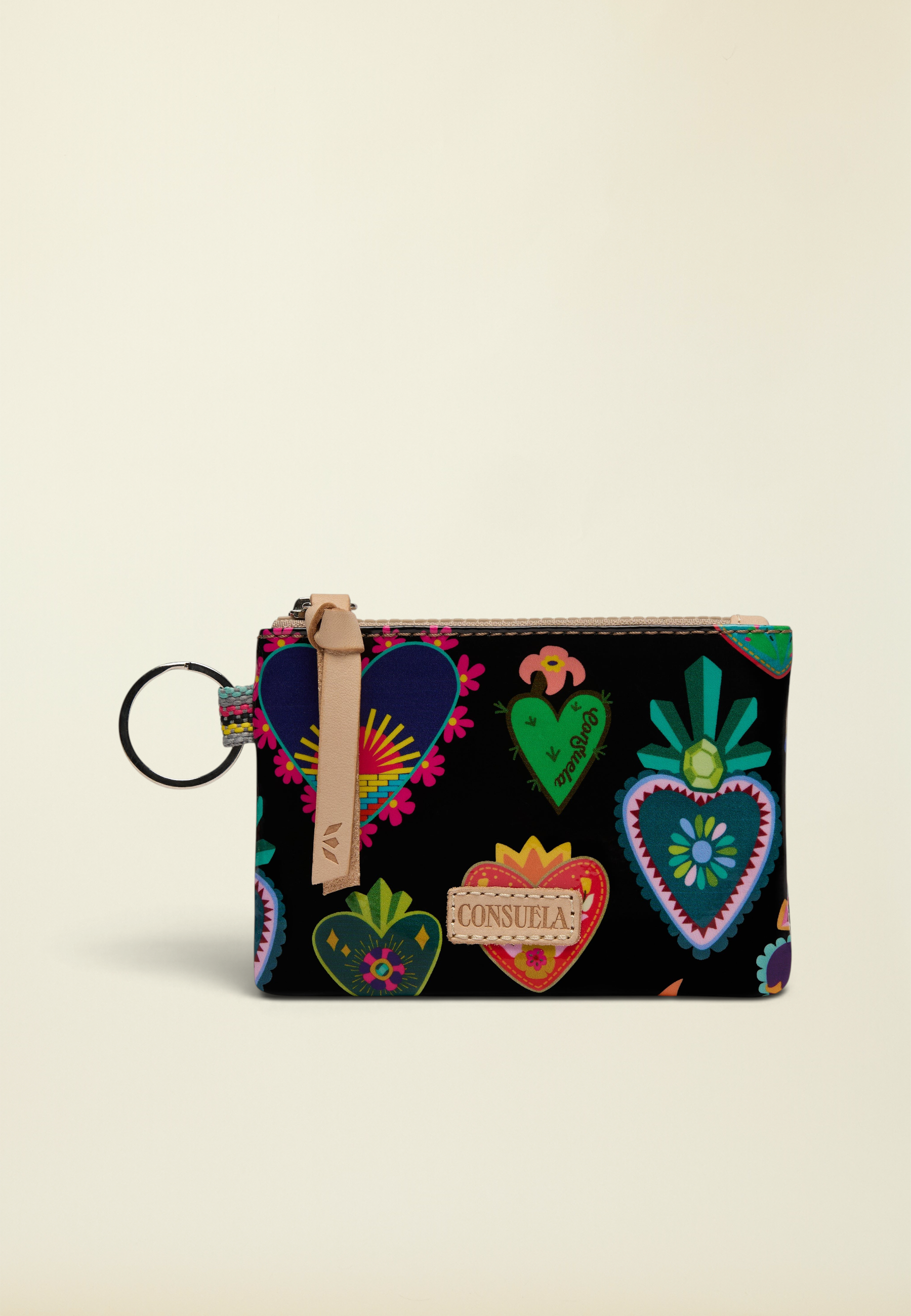 Point of Origin Consuela Vida Pouch in navy with colorful heart print, leather zipper pull, and attached metal keyring.