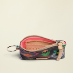 Point of Origin Consuela Vida Pouch in navy with colorful bug print, pink interior, and natural leather zipper pull.