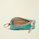 Point of Origin Consuela Shay glitter pouch in teal with a natural leather zipper pull and interior card slot.