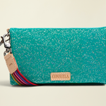Point of Origin Consuela Shay Uptown Crossbody in teal with silver flecks, natural leather trim, and wristlet strap.