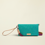 Point of Origin Consuela Shay Uptown Crossbody in teal with natural leather trim and a colorful woven strap.