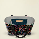 Point of Origin Consuela Vida Big Breezy tote bag with black heart-patterned exterior and grey glitter interior.