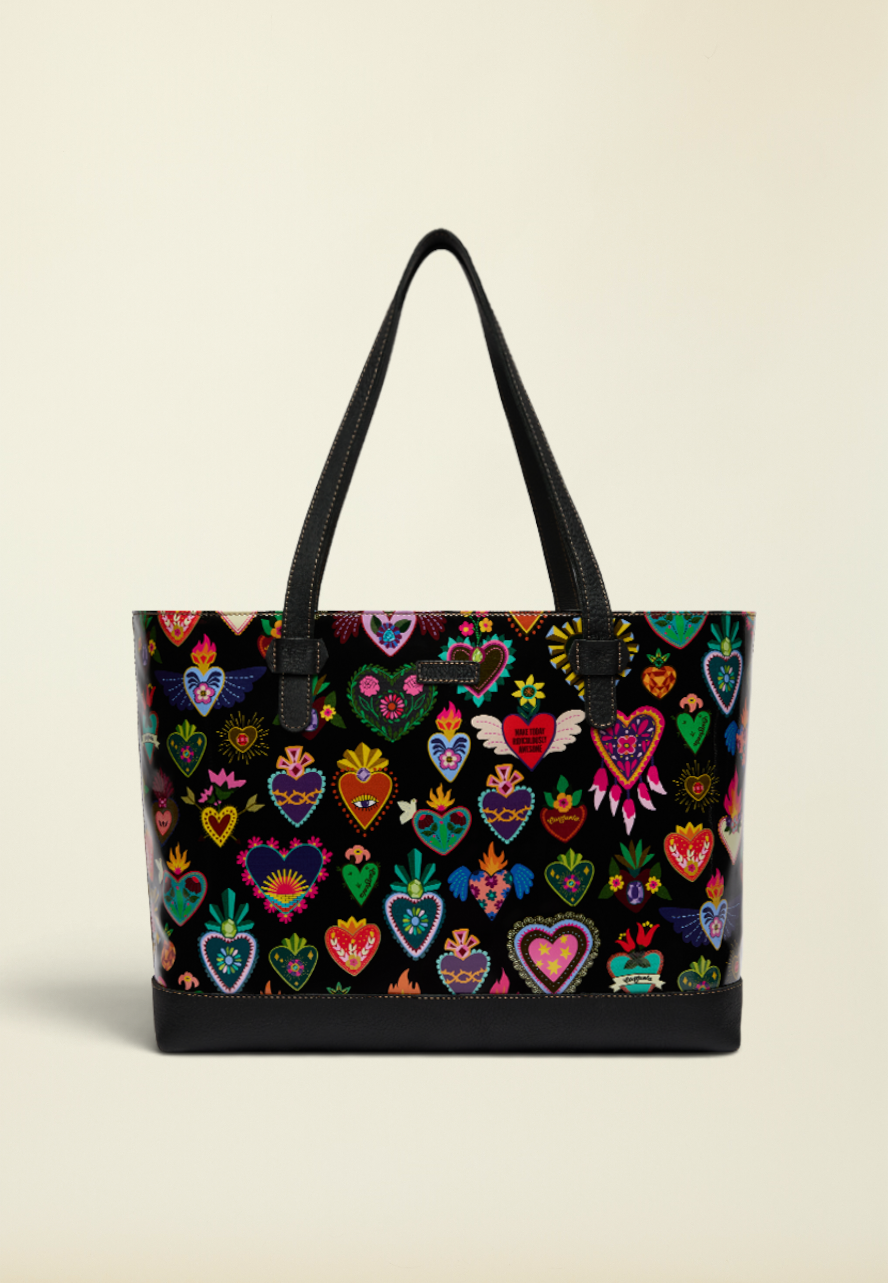 Point of Origin Consuela Vida Big Breezy tote bag with colorful heart pattern on black ConsuelaCloth and leather base.