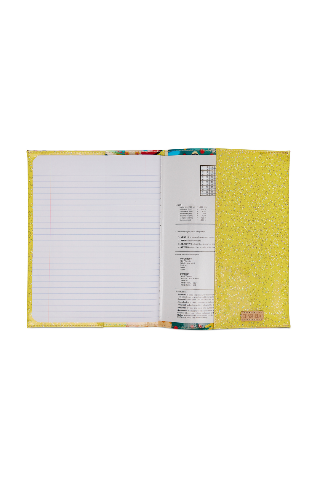 Open notebook with lined pages and colorful cover on a white background
