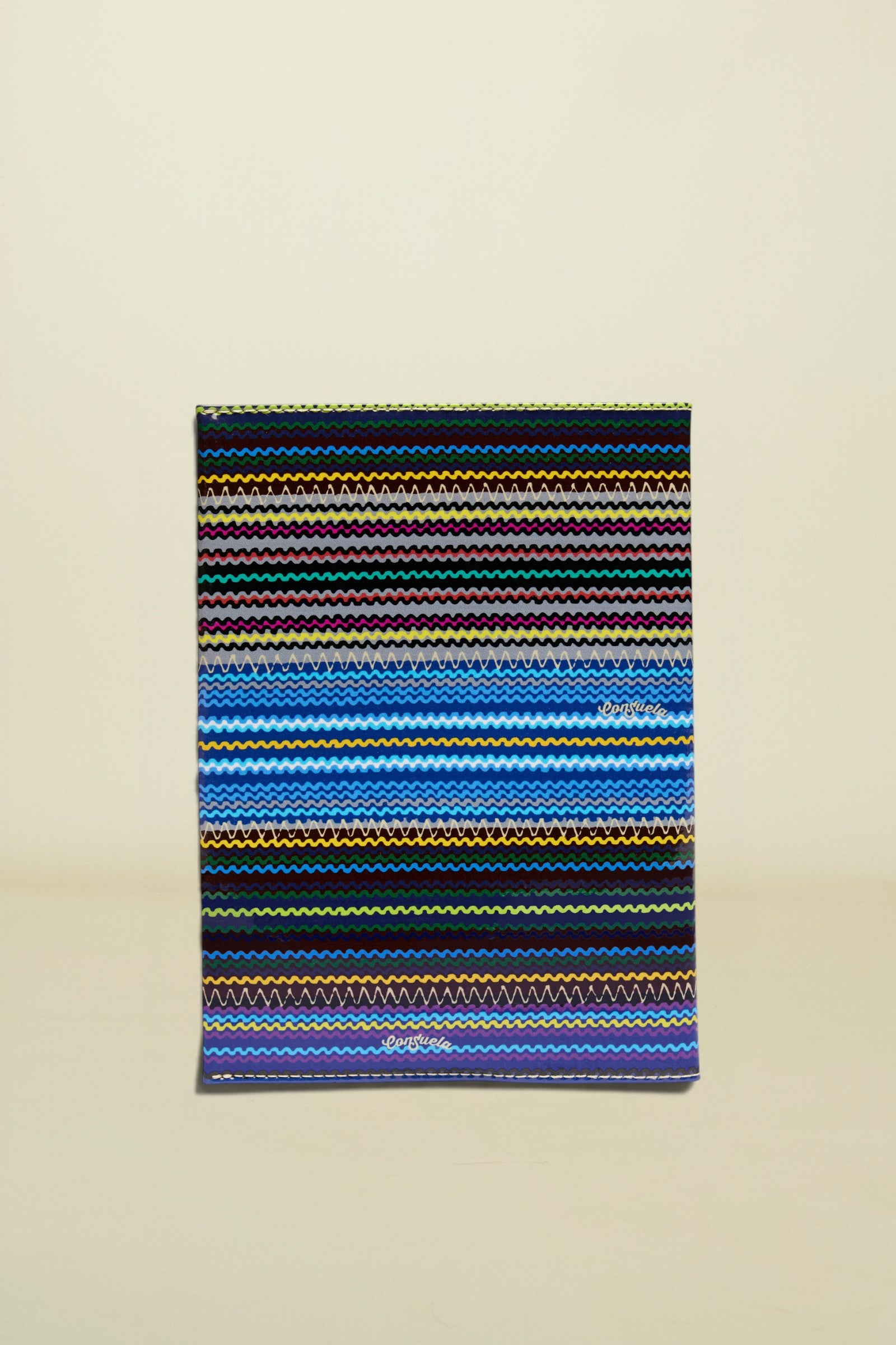 Multicolored striped towel with a brand logo on a white background