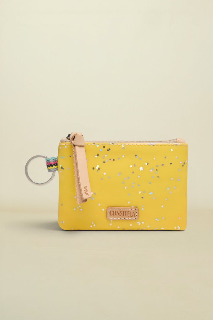 Yellow pouch with floral pattern and keychain on a white background