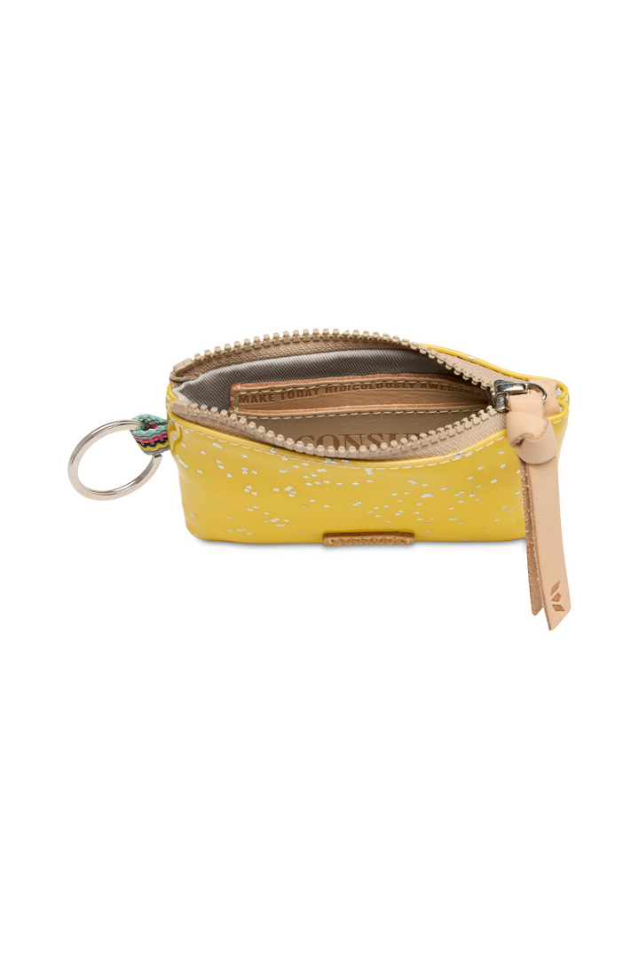 Yellow coin purse with a key ring on a white background
