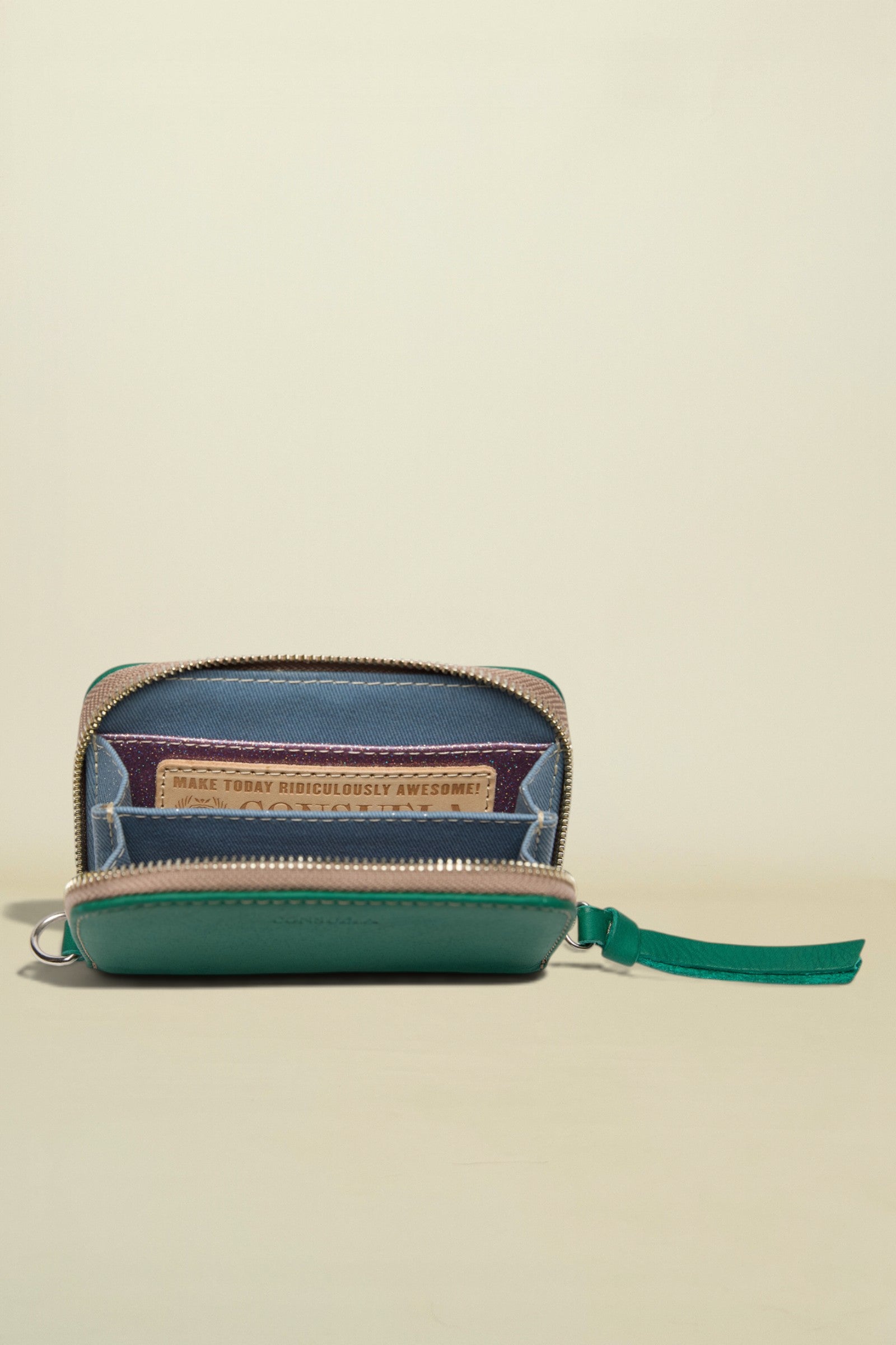 Green wallet with a zipper on a white background