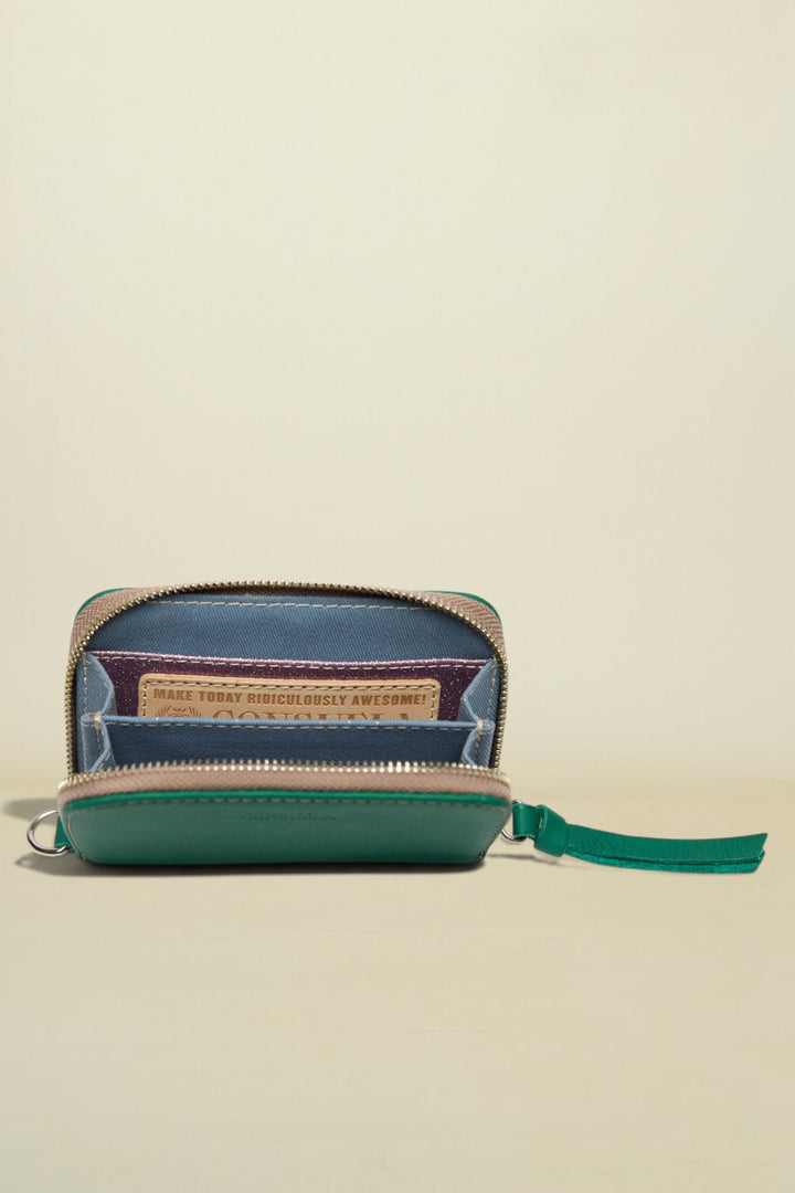 Green wallet with a zipper on a white background