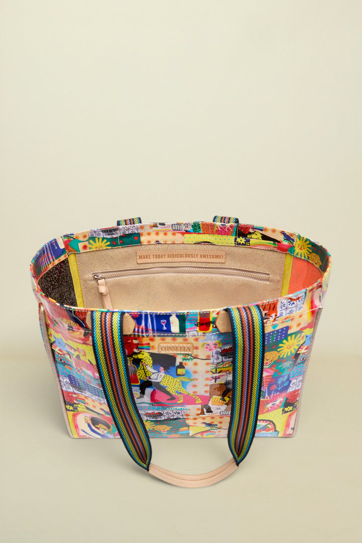 Multicolored tote bag with a patterned design on a white background