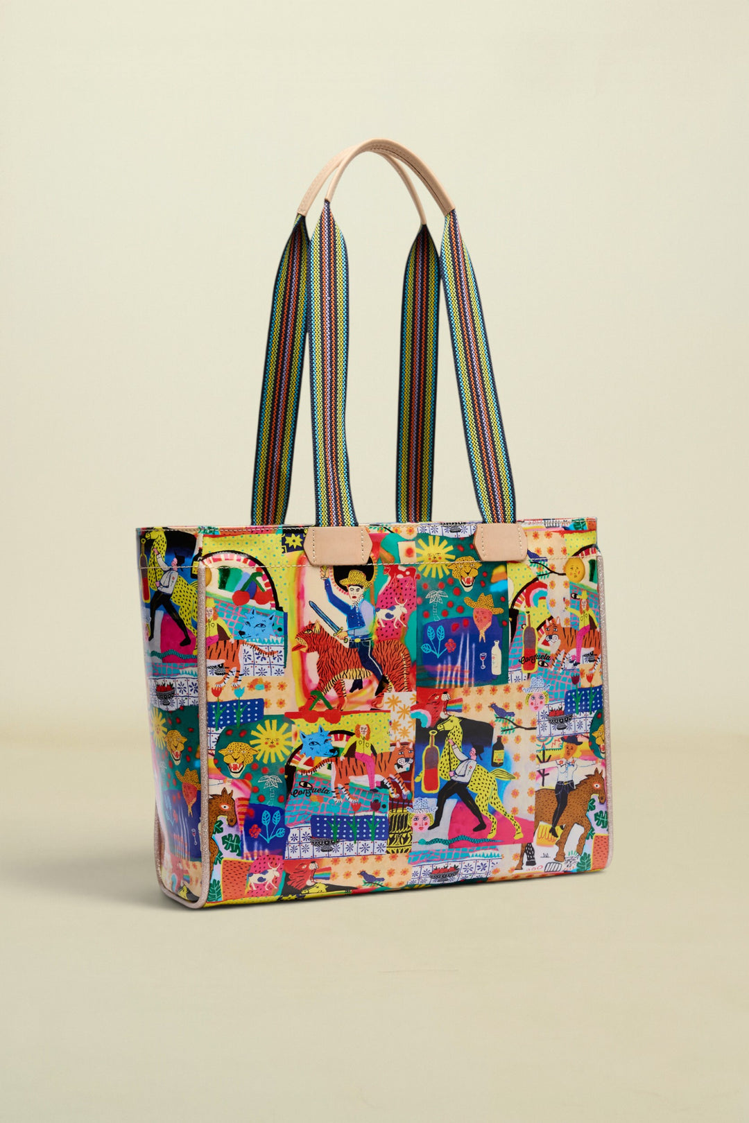Colorful tote bag with a pattern of people and animals on a white background