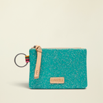 Point of Origin Consuela Shay glitter pouch in teal with a natural leather zipper pull and attached metal keyring.