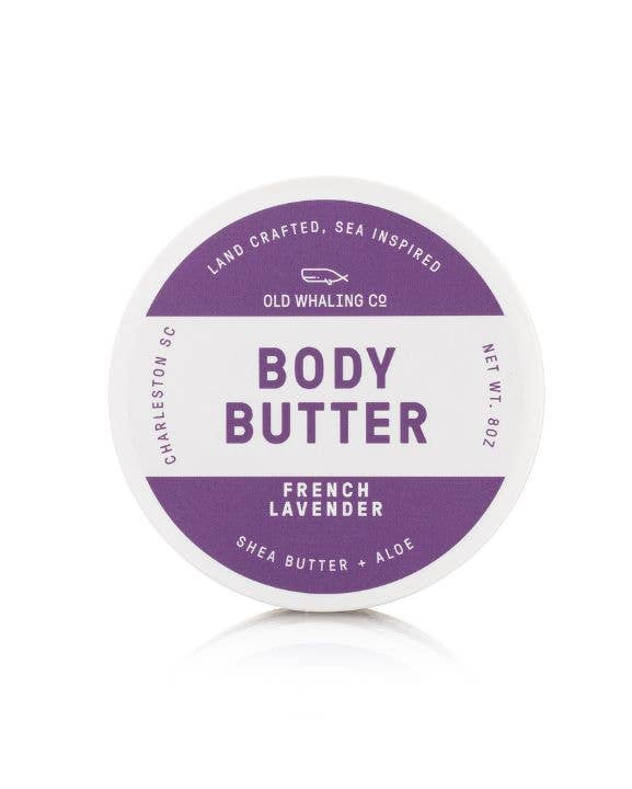 Body butter container with purple and white label on a white background