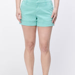 Person wearing light blue shorts on a white background