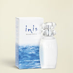 Inis The Energy of the Sea cologne spray bottle and its packaging box, featuring a white bottle with a clear bubbly cap and a box with a blue ocean wave design.