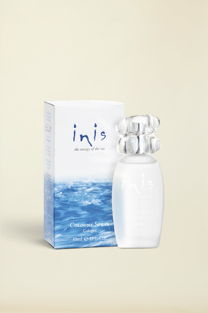 Inis The Energy of the Sea cologne spray bottle and its packaging box, featuring a white bottle with a clear bubbly cap and a box with a blue ocean wave design.