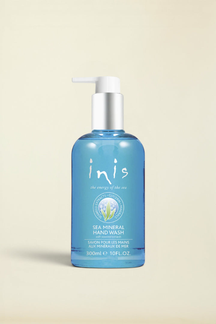 A 300ml bottle of Inis Sea Mineral Hand Wash with a blue body, silver pump, and white label, set against a plain white background.