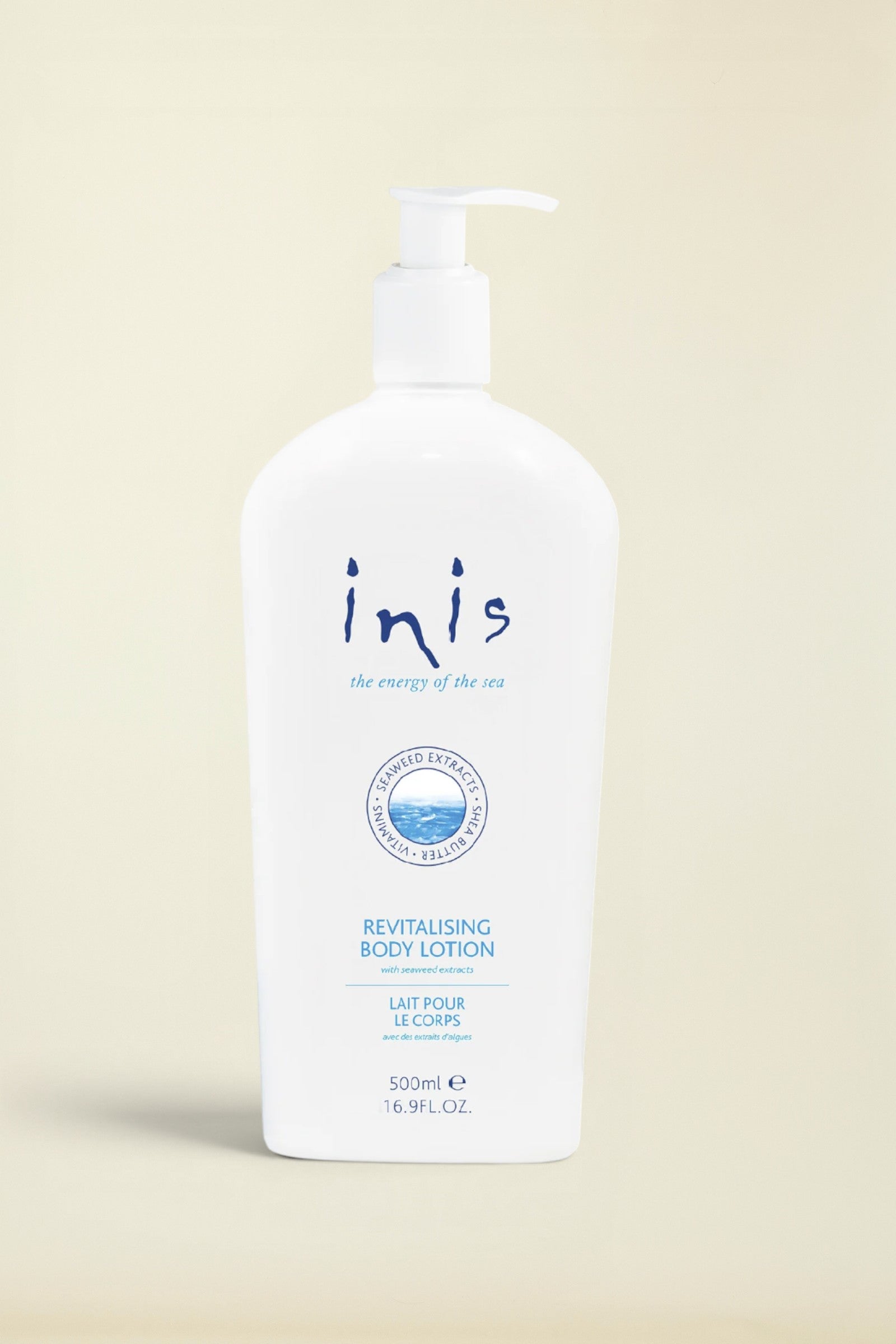 A 500ml white pump bottle of Inis Revitalising Body Lotion on a clean white background.