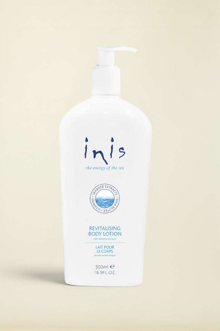 A 500ml white pump bottle of Inis Revitalising Body Lotion on a clean white background.