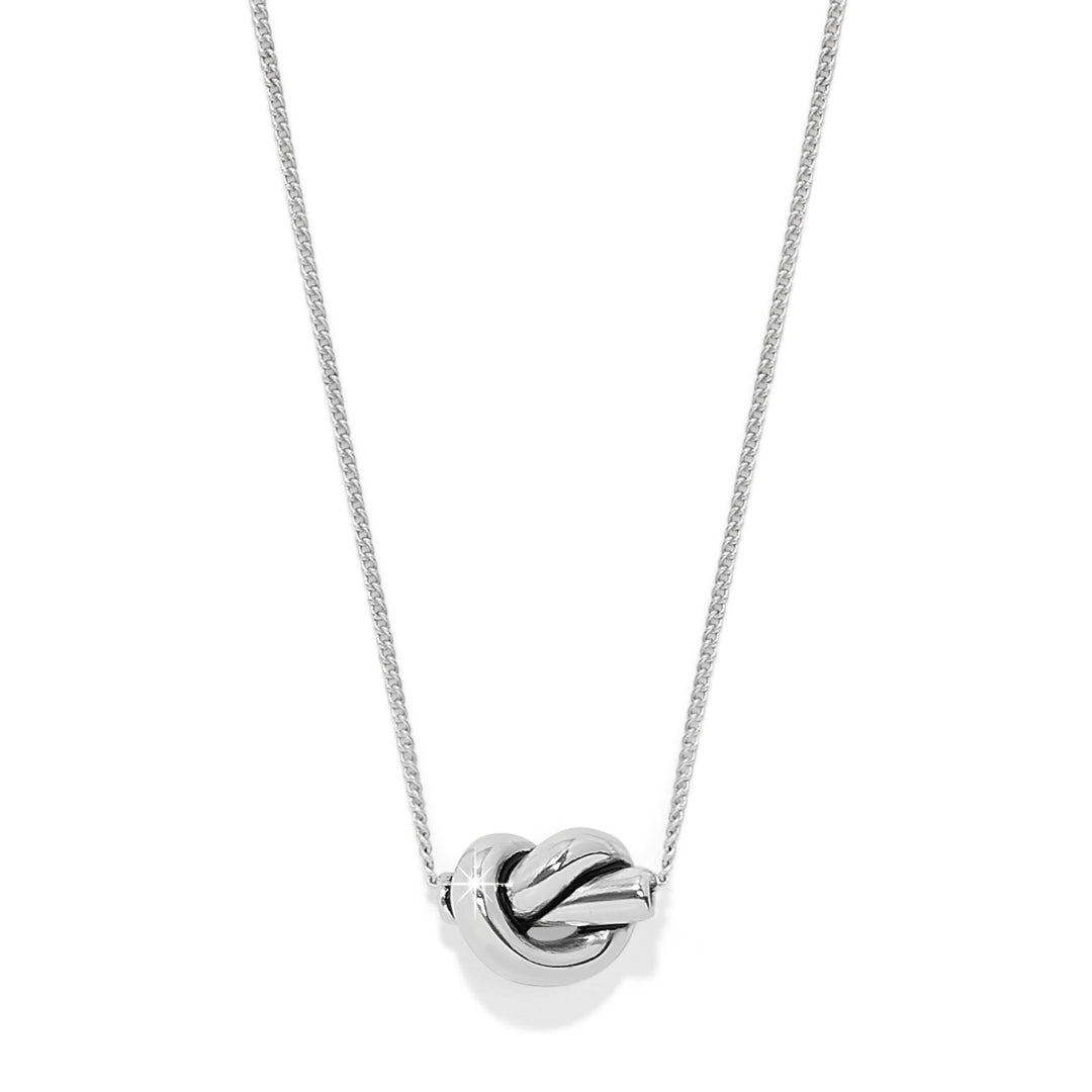Silver knot pendant necklace on a white background