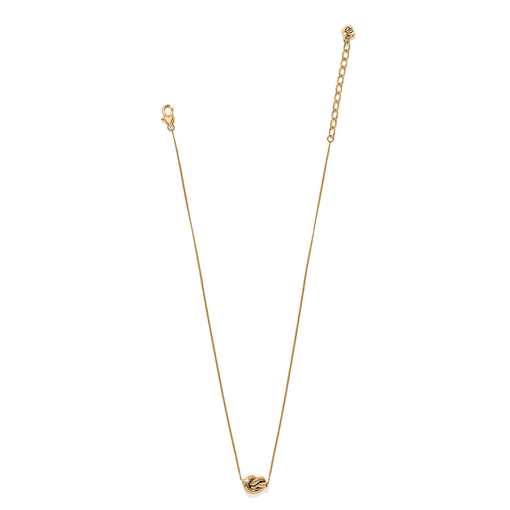 Gold necklace on a white background