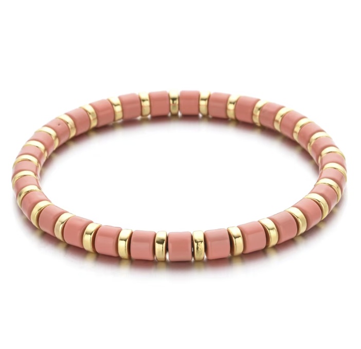 A black and gold colored bracelet with a simple pattern, made of enamel and gold-tone beads.