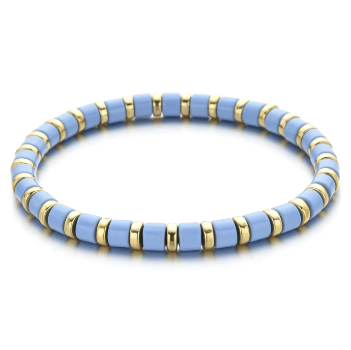 A black and gold colored bracelet with a simple pattern, made of enamel and gold-tone beads.