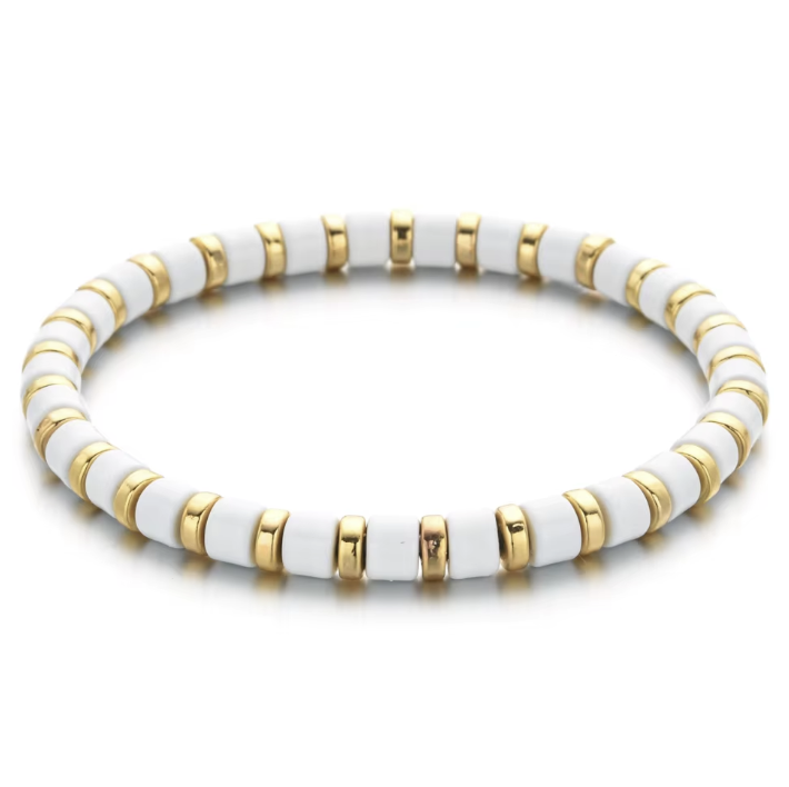 A black and gold colored bracelet with a simple pattern, made of enamel and gold-tone beads.