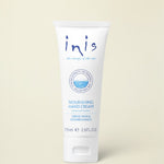A white squeeze tube of Inis Nourishing Hand Cream with blue text and logo details, set against a clean white background.