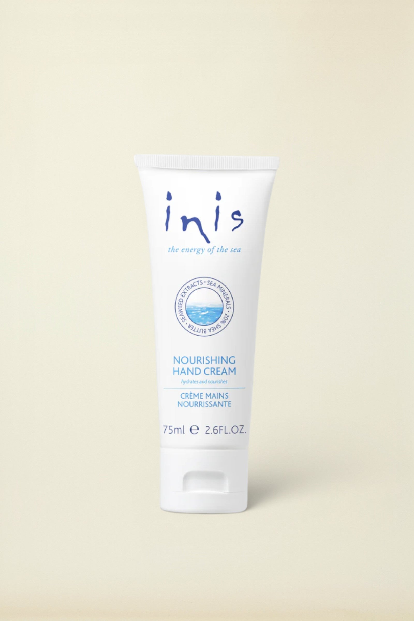A white squeeze tube of Inis Nourishing Hand Cream with blue text and logo details, set against a clean white background.