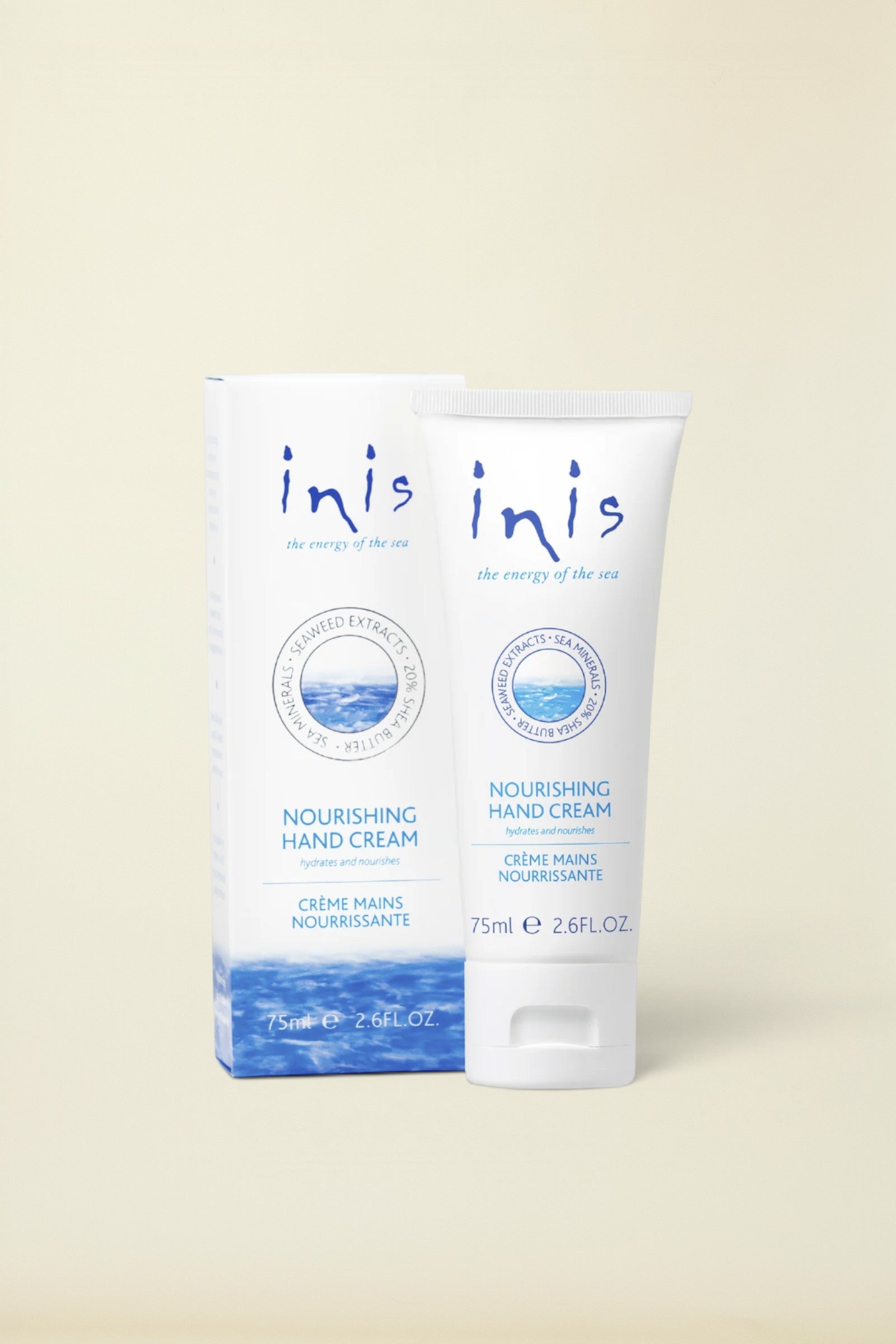 A 75ml squeeze tube of inis Nourishing Hand Cream standing next to its matching retail box. The packaging features a clean white design with blue text and a circular ocean graphic, set against a plain white background.