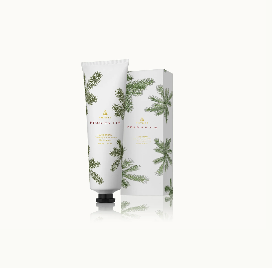 Hand cream with packaging featuring Frasier Fir tree design on a white background