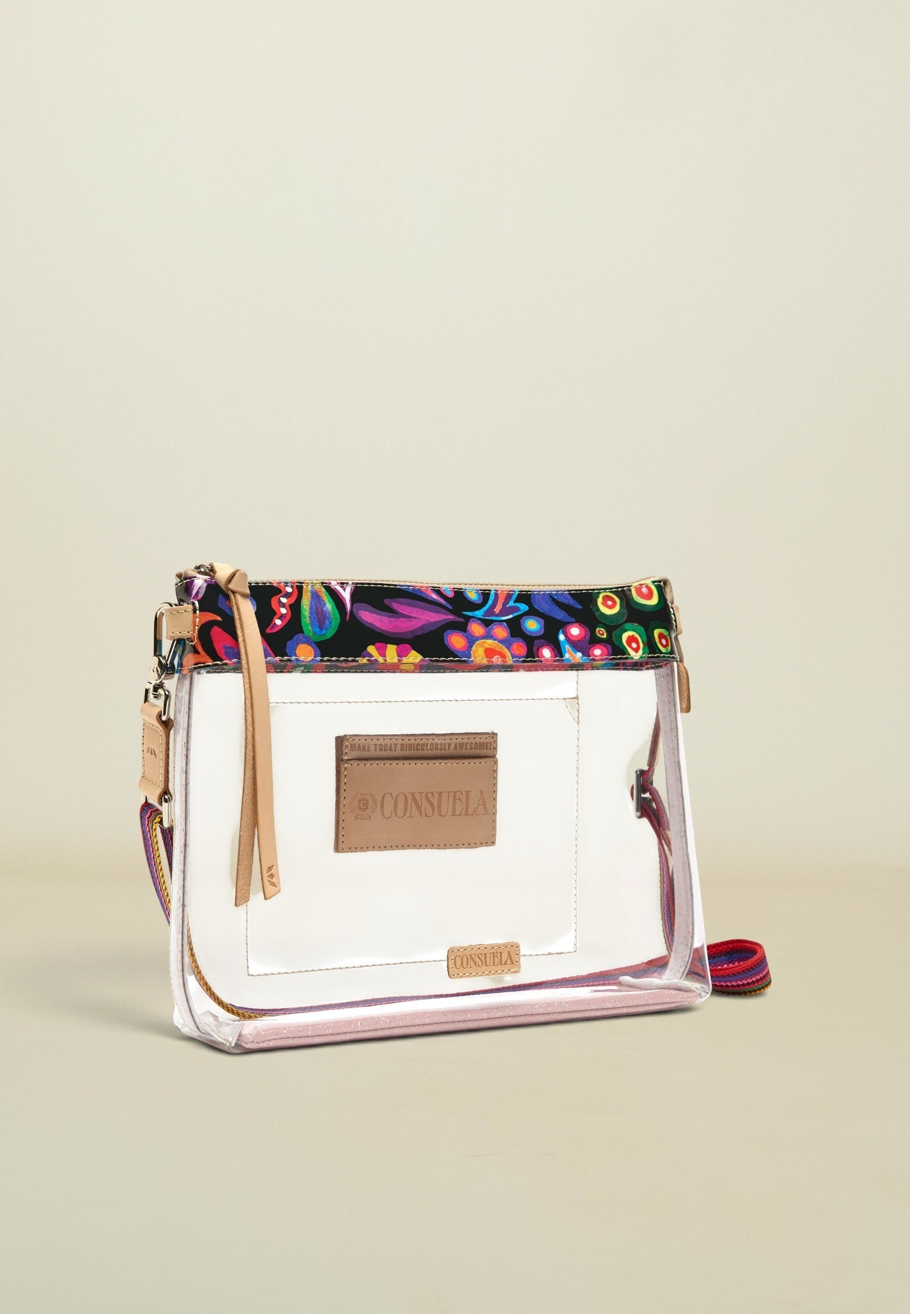 Point of Origin Consuela clear crossbody bag with floral Sophie ConsuelaCloth trim, leather accents, and woven strap.