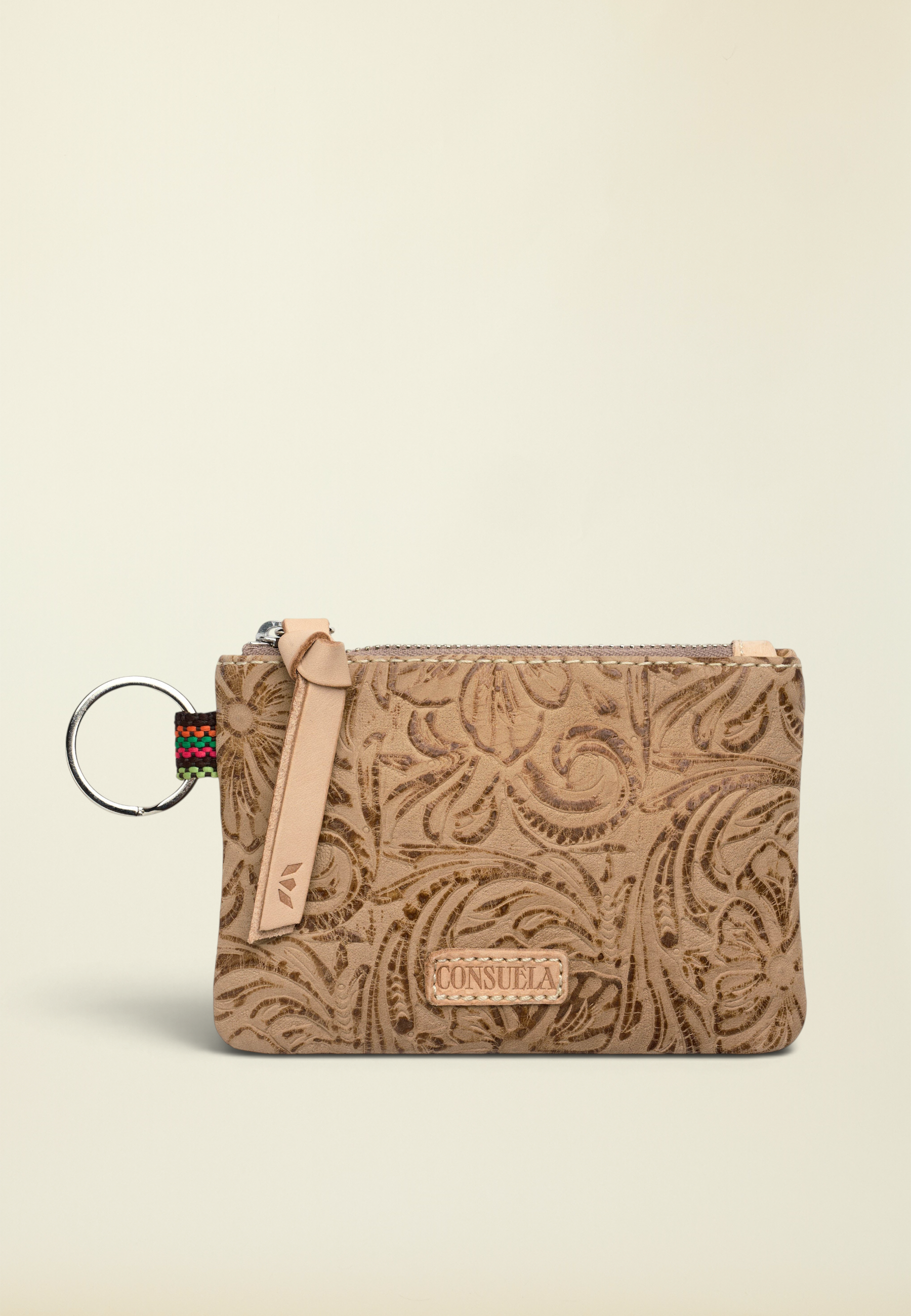 Point of Origin Consuela Lawton pouch in tan tooled leather with a zipper closure and attached metal keyring