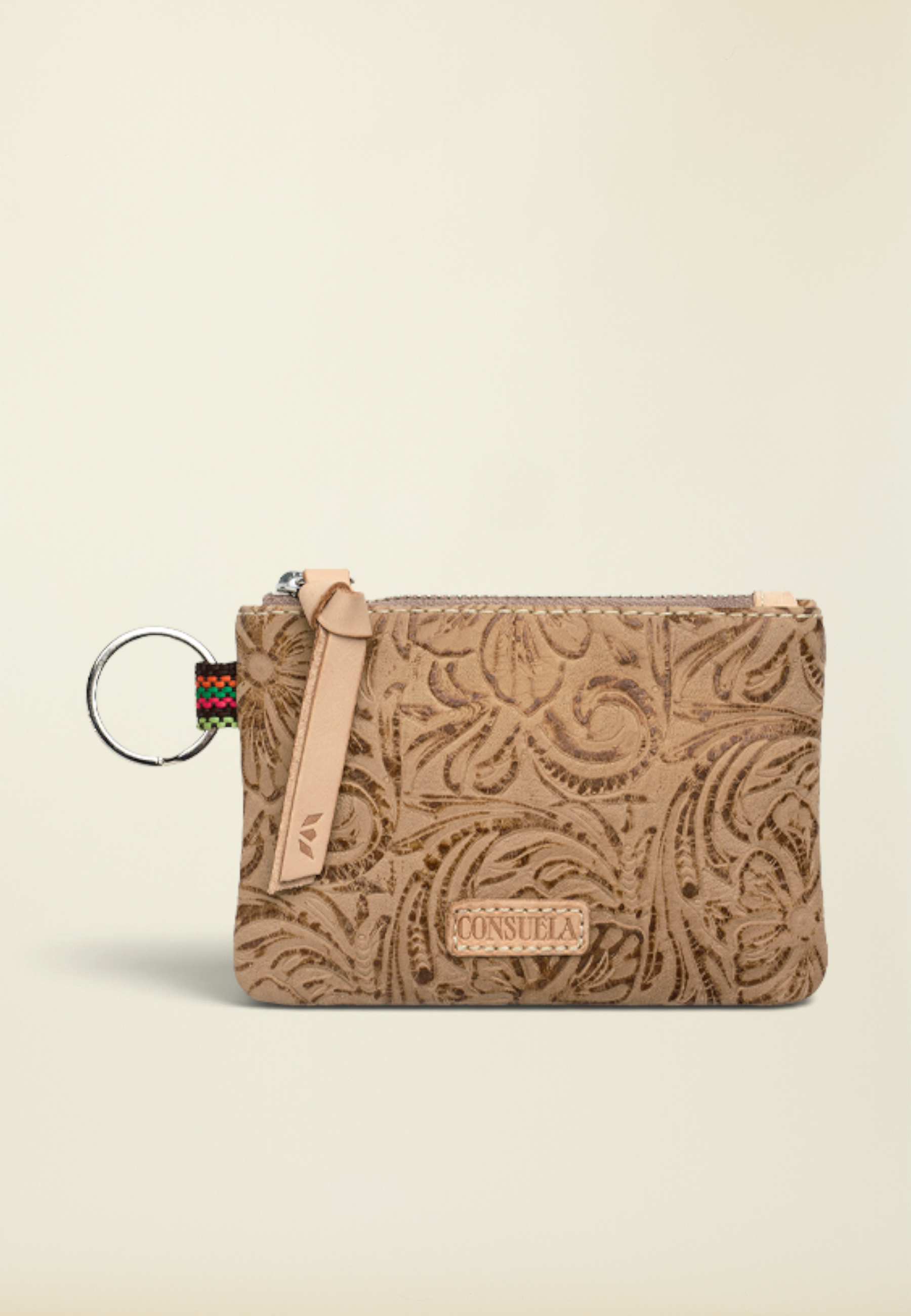Point of Origin Consuela Lawton pouch in tan tooled leather with a zip closure, leather pull, and attached keyring.
