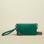 Point of Origin teal Uptown crossbody bag with a detachable multi-colored woven strap and wristlet