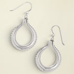 Silver teardrop earrings on a white background