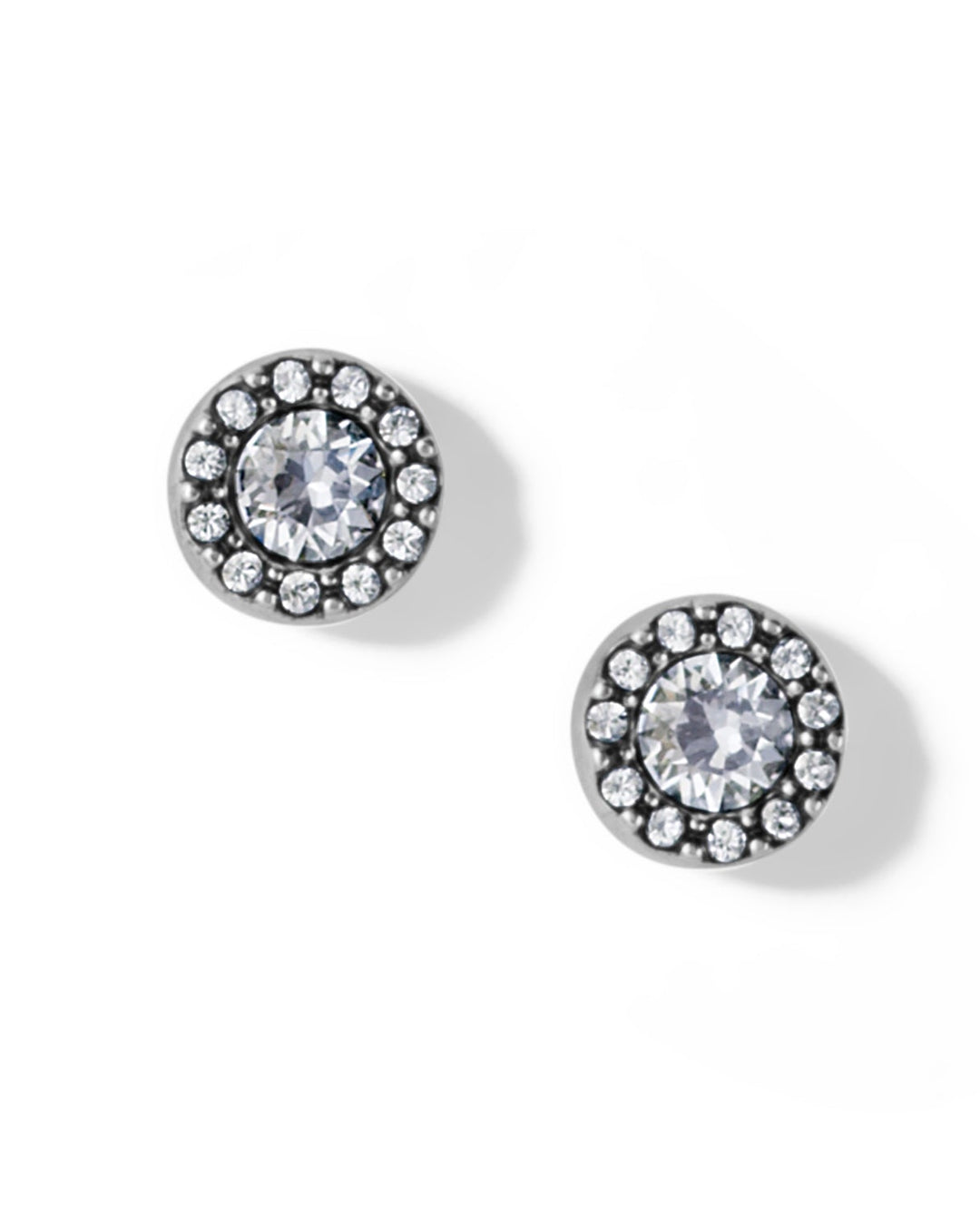 Pair of round stud earrings with clear gemstones on a white background
