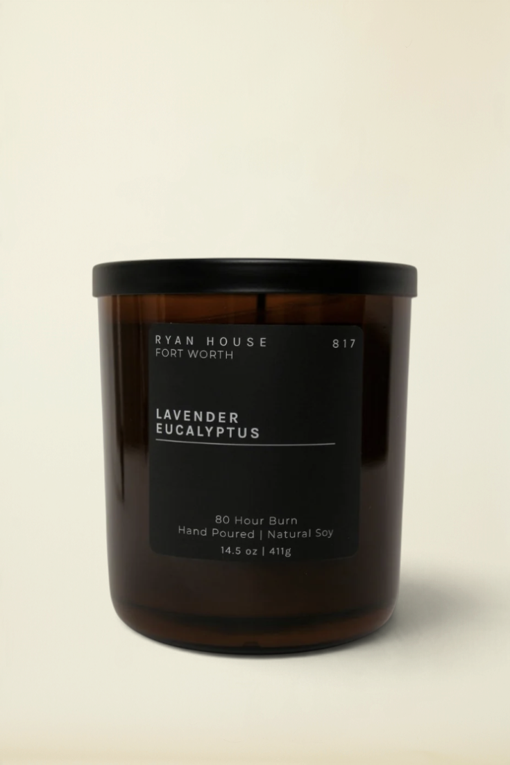 Point of Origin Ryan House Lavender Eucalyptus soy candle in a brown glass jar with a black lid and minimalist label