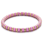 Pink and gold beaded bracelet on a white background
