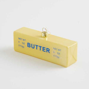 There is only one universal truth in life, and here it is: Everything is better with butter! You know we're right, which is why you're about to buy this clever little Stick of Butter Glass Christmas Ornament! It's the perfect stocking stuffer for the baker in your life, or for anyone who—like us—will sing butter's praises to the end of the earth!