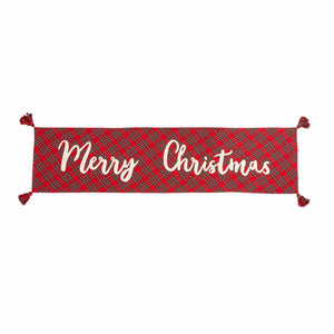 The timeless design of tartan with a "Merry Christmas" accent on one side is designed to work with any style, from traditional to farmhouse to modern. Layer this cotton table runner with all-white dinnerware for a classic look or iconic holiday patterns for a more playful ensemble.   Red tartan "Merry Christmas" runner with tassels reverses to white tartan. Size: 18" x 72" Material: COTTON