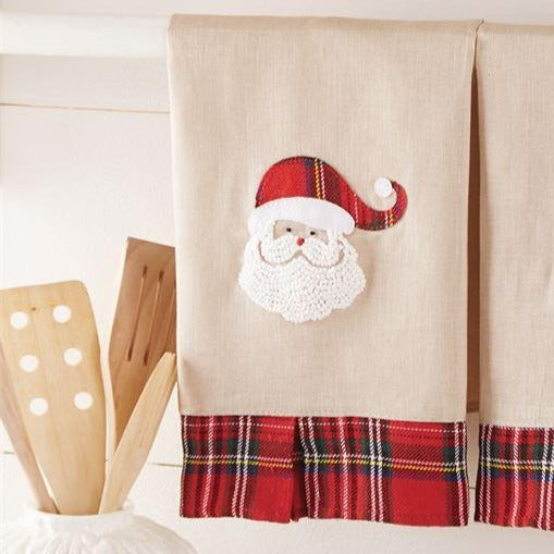 Santa and plaid, two holiday favorites together on this linen hand towel. Features tartan pleated hem and hand-knotted French knot Santa with tartan hat applique and dimensional tartan pleated bottom.  Size: 21" x 14"